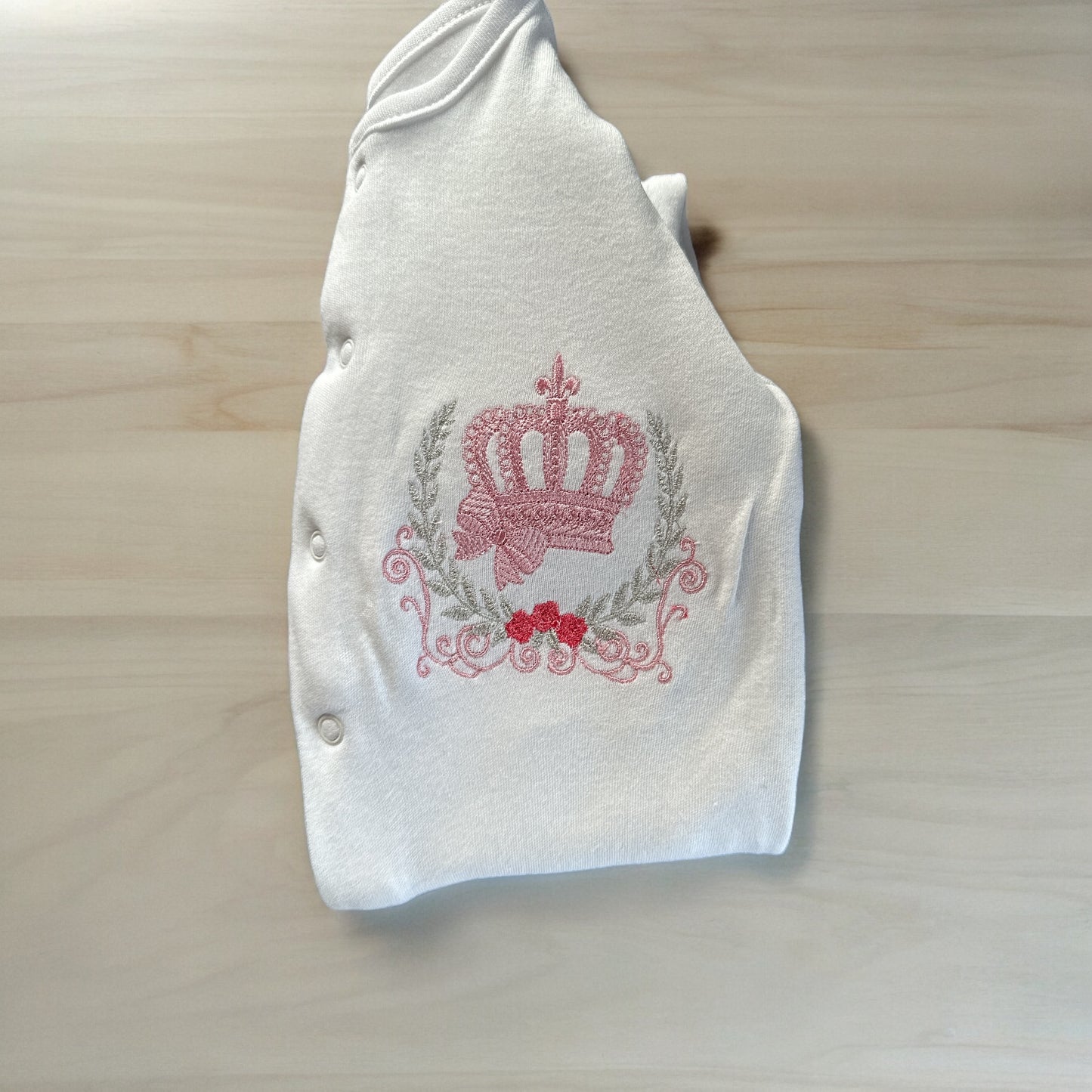 Embroidered crown baby grown